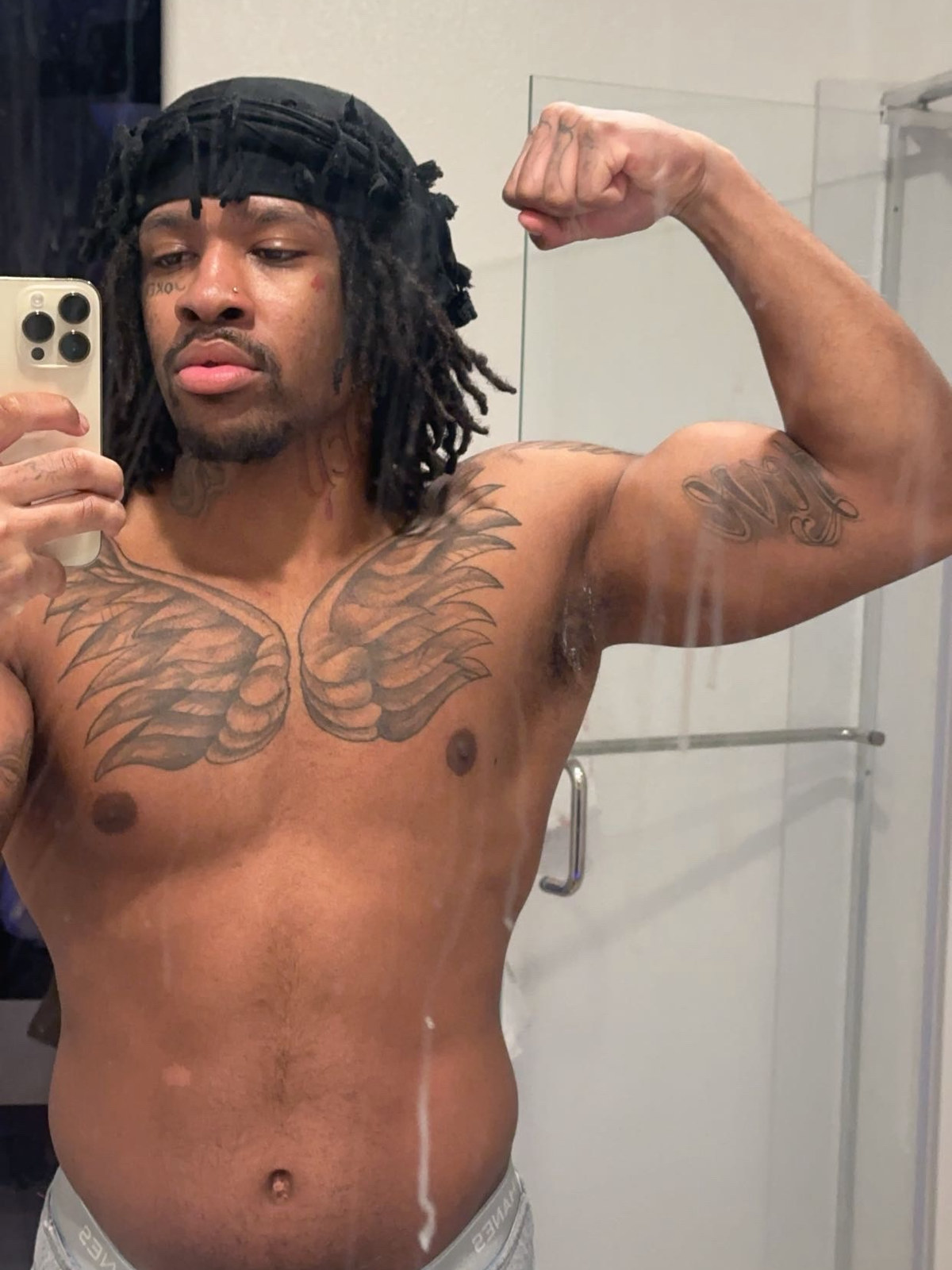 Before: Will flexing in a bathroom mirror